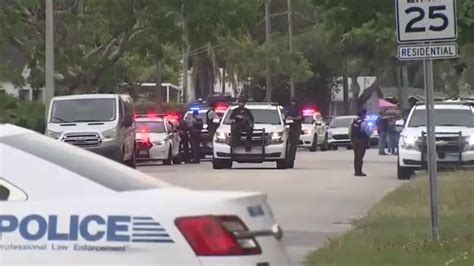 MDPD officer hospitalized after shooting in Miami leads to street closures; 1 in custody, 1 at large